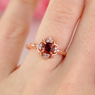 Garnet Ring- 14K Rose Gold Vermeil by Aquamarise featuring a deep red garnet center with intricate antique-style rose gold vermeil band and sparkling accent stones, perfect for January birthstone jewelry.