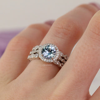 Alexandrite Halo Ring in Sterling Silver by Aquamarise featuring a round lab-created alexandrite center with a sparkling pavé halo on an elegant sterling silver band.