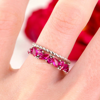 Willow Marquise Cut Ruby Stacking Ring Set in Sterling Silver featuring vibrant marquise-cut rubies and a twisted silver band by Aquamarise in a bold, romantic design.