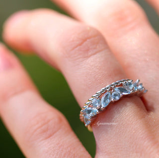 Willow Marquise Aquamarine Stacking Ring Set in Sterling Silver by Aquamarise featuring marquise-shaped simulated aquamarines with a twisted silver band in an elegant, nature-inspired design.